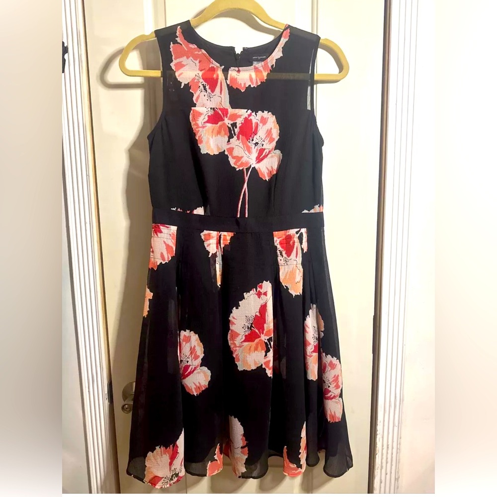 Ann Taylor dress, size 0, color black with flowers, perfect condition.